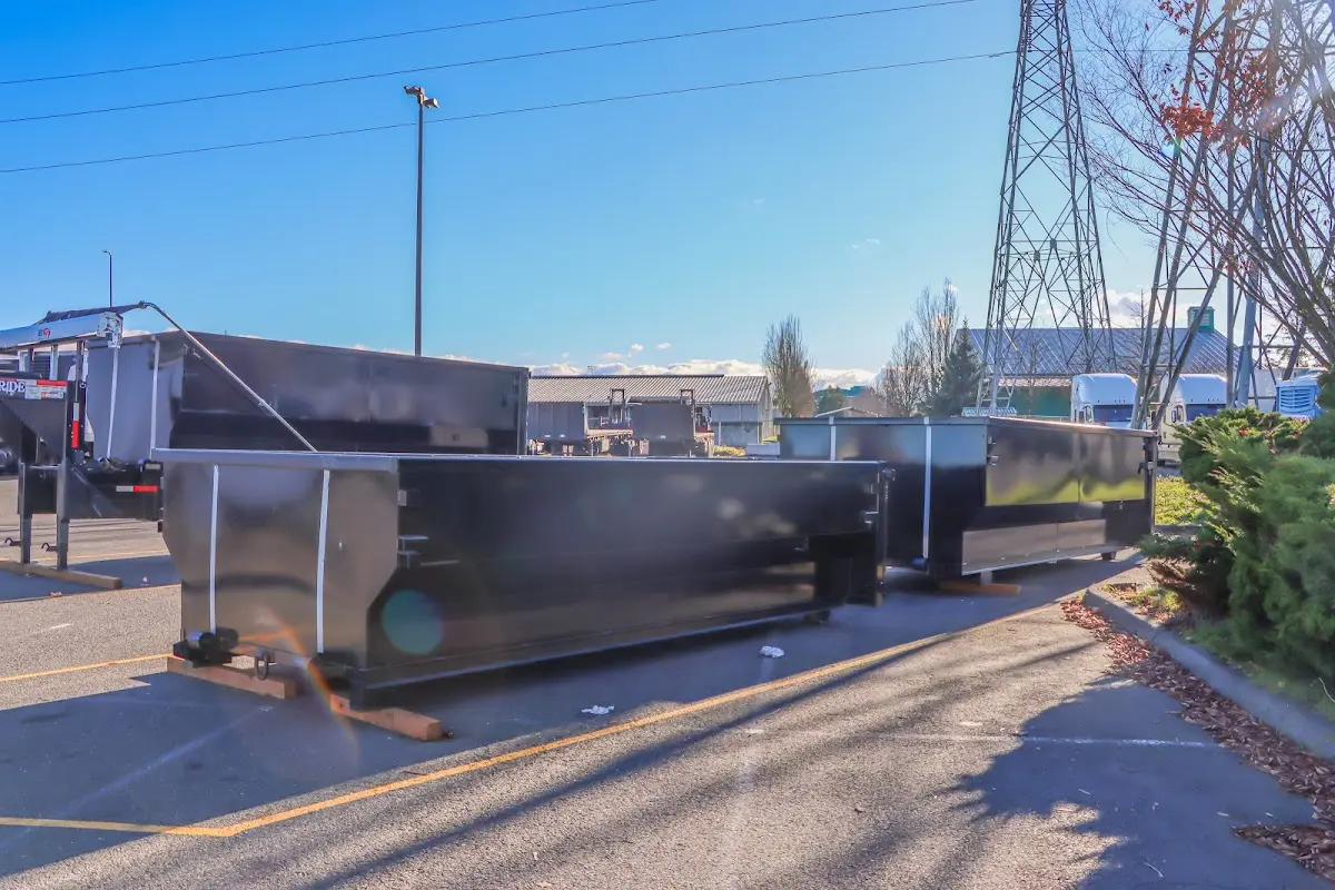 Roll-off dumpster ready for waste disposal at job site for Demolition Dumpster Rental in Fairfield